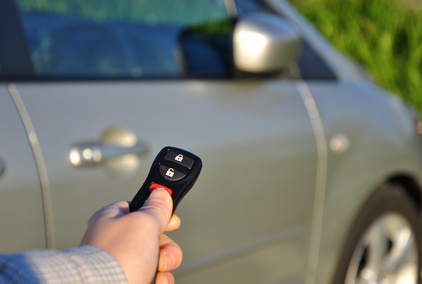 A hand holding car keys